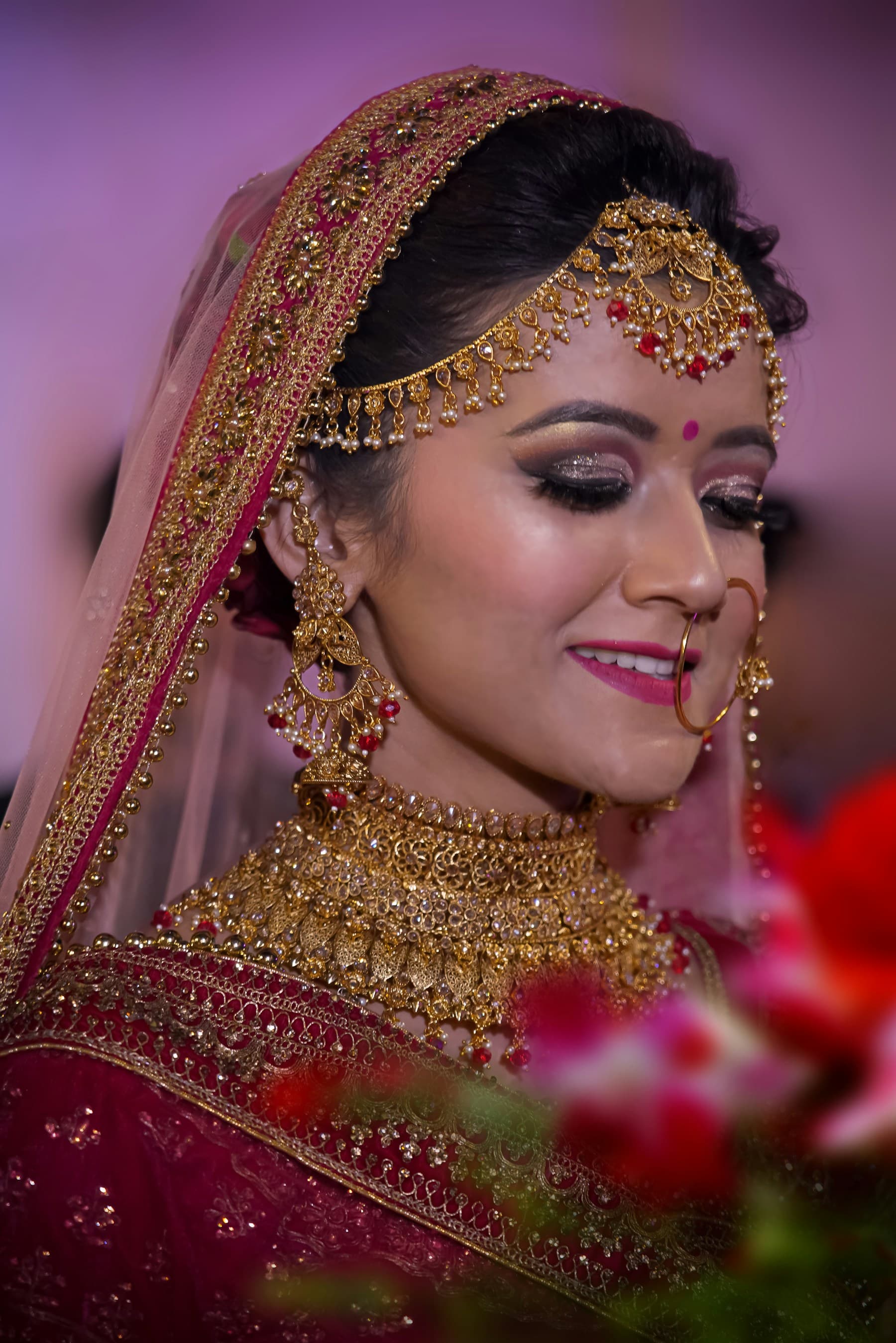 Indian bride wearing traditional gold jewellery